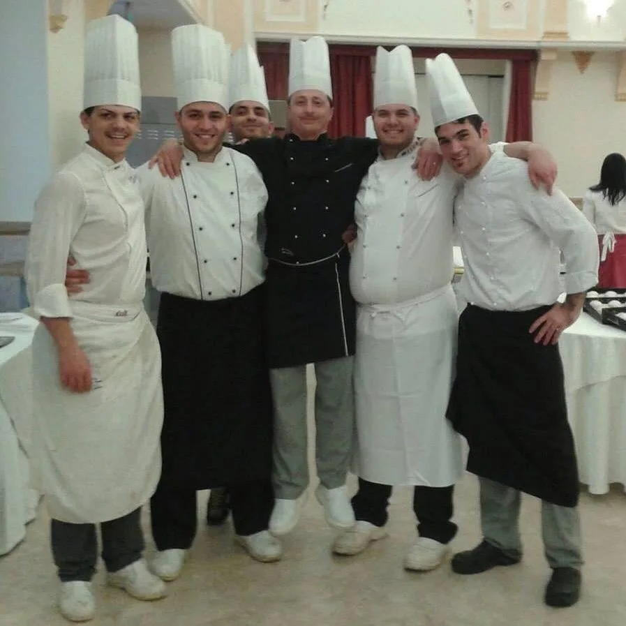 Chef Gabriele Franco with his kitchen brigade